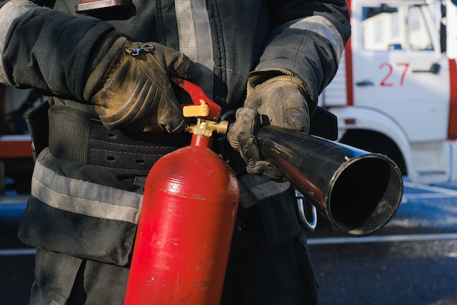 man with fire extinguisher