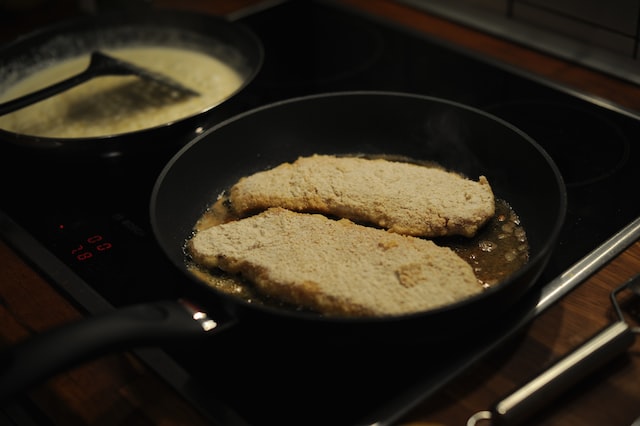 steak on black frying pan