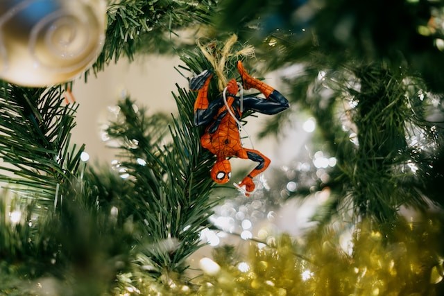 Spiderman toy hanging on the Christmas tree